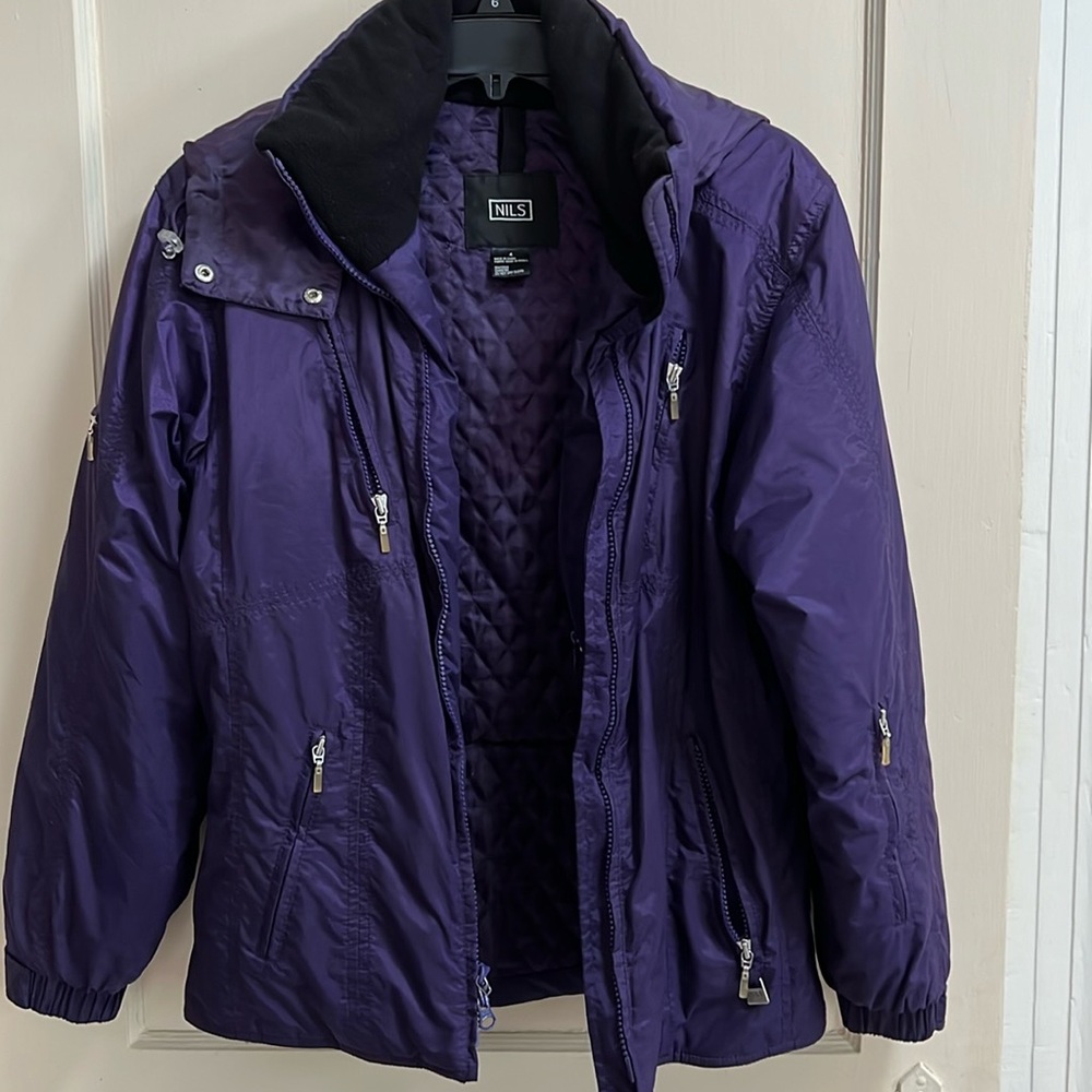 Nils Woman’s Purple Ski Jacket. Size 4. Runs big.